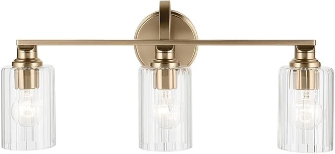 Kichler Gioe 24.25" 3-Light Bathroom Vanity Light Fixture with Clear Fluted Glass in Champagne Bronze, Damp Rated for Mirror, Powder Room (24.25" W x 10.5" H), 55226CPZFLU