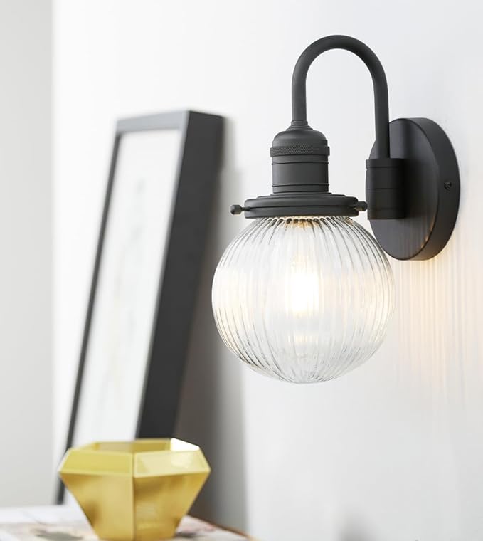 Yosoan 1-Light Brass Modern Vintage Indoor Wall Sconce, Vanity Single Luxury Hardwired Retro Textured Striped Globe Round Clear Glass Shade with Industrial Curved Rod Bathroom Lamp(Black)