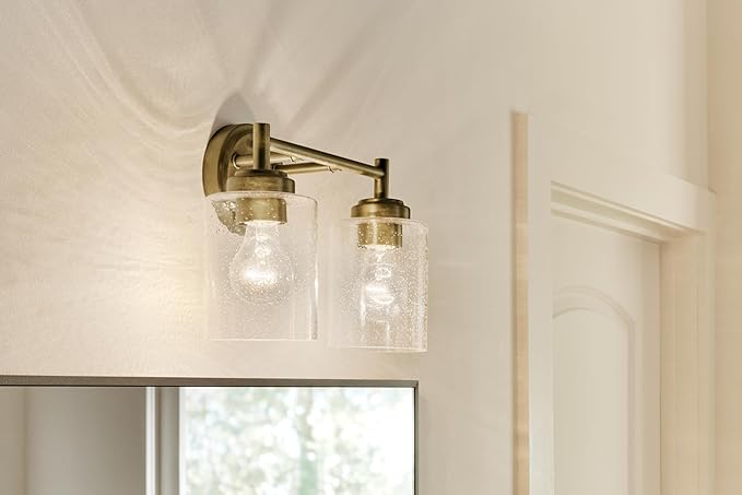 Kichler Winslow 13" 2-Light Bathroom Vanity Light Fixture with Clear Seeded Glass in Natural Brass for Luxe Industrial Style Over Mirror (13" x 9.25" x 6.5"), 45885NBR