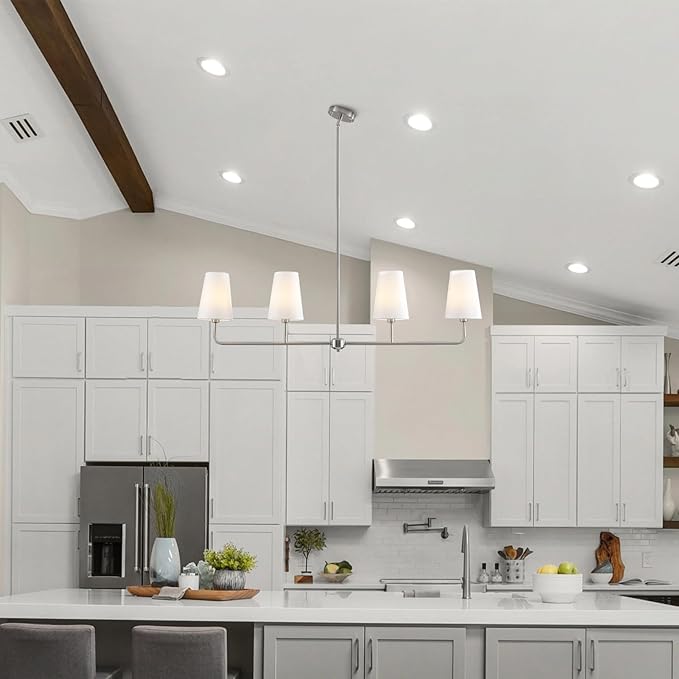Brushed Nickel Chandelier for Kitchen Island 4-Light Linear Chandeliers for Dining Room Modern Farmhouse Classic Light Fixture with White Linen Shades Over Dining Table