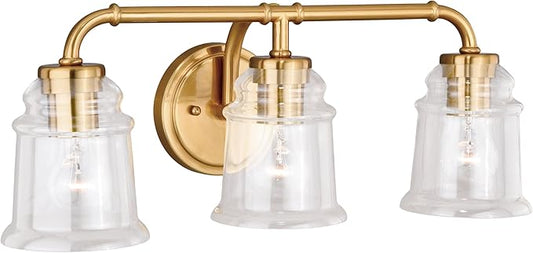 VAXCEL Toledo 3-Light 22 inch Wide Natural Brass Gold Industrial Bathroom Vanity Lighting Fixture, Clear Glass Shade, Dimmable, LED Compatible, Over The Mirror Mounted Steel Wall Sconce