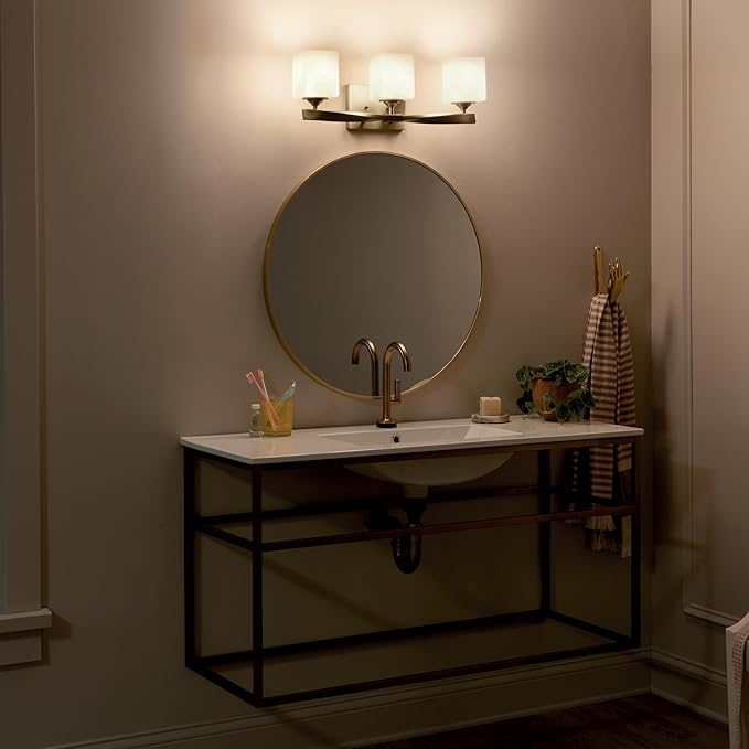 Kichler Marette 23" 3-Light Bathroom Vanity Light Fixture with Satin Etched Cased Opal Glass in Champagne Bronze for Bathroom and Powder Room (23" x 8.25" x 6"), 55002CPZ