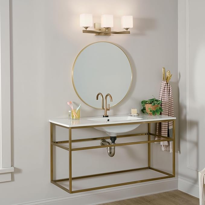Kichler Marette 23" 3-Light Bathroom Vanity Light Fixture with Satin Etched Cased Opal Glass in Champagne Bronze for Bathroom and Powder Room (23" x 8.25" x 6"), 55002CPZ