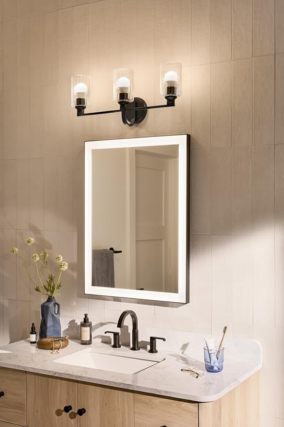 Kichler Gioe 24.25" 3-Light Bathroom Vanity Light Fixture with Clear Fluted Glass in Black, Modern Wall Mount Over Mirror for Powder Room, Damp Rated (24.25" W x 10.5" H), 55226BKFLU