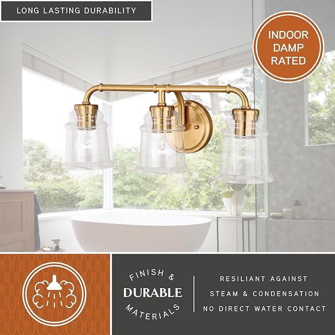 VAXCEL Toledo 3-Light 22 inch Wide Natural Brass Gold Industrial Bathroom Vanity Lighting Fixture, Clear Glass Shade, Dimmable, LED Compatible, Over The Mirror Mounted Steel Wall Sconce